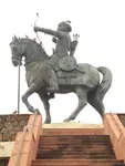 1200px-Prithviraj_Chauhan_III_statue_at_Qila_Rai_Pithora,_Delhi.jpg