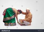 stock-photo-hindu-female-touching-his-feet-with-all-due-respect-with-hands-showi.jpg