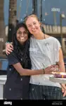 durban-south-africa-january-07th-2019-an-indian-and-a-caucasian-white-woman-hugg.jpg